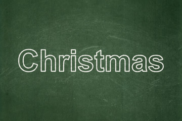 Fototapeta premium Holiday concept: Christmas on chalkboard background