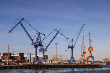 Fototapeta na wymiar Loading terminal with cranes at rostock harbor