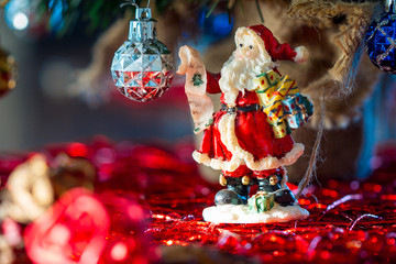 Santa Figure under Christmas Tree
