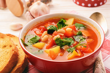 Hot bean soup with bacon and vegetables.