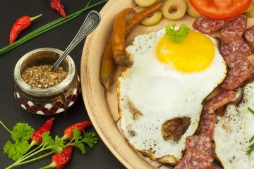 Fried Eggs on a plate. A hearty breakfast for athletes. Healthy food.
