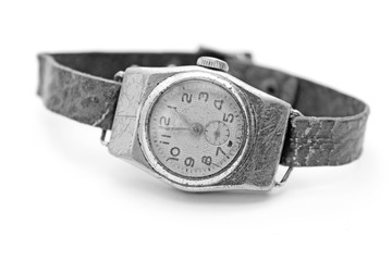 old men's wristwatch on a white background / black and white photo in retro style