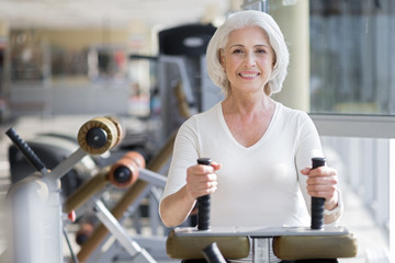 Attractive fit senior woman working out.