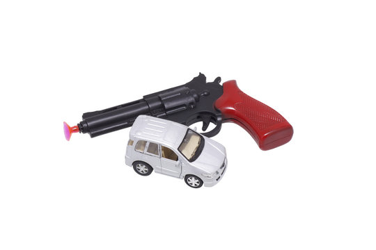 Toy gun and car.