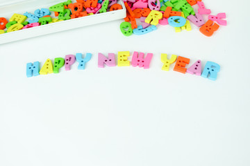 Colorful letters "HAPPY NEW YEAR". White background.
