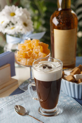 Coffee latte with marmalade and liqueur