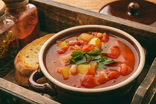 Hot bean soup with bacon and vegetables.