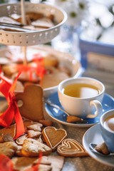 Tea with cookies for breakfast composition in the restaurant