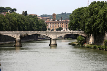 Naklejka premium Old bridge and Tiber river in Rome . Italy