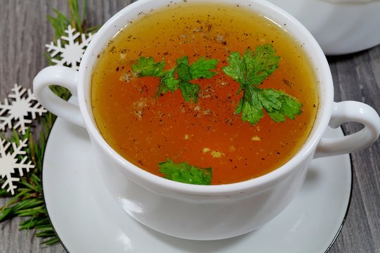 Traditional broth served at Christmas dinner - energy and warming meal on a cold day
