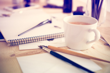 Paper, ink and calligraphy pens. Lettering workshop details
