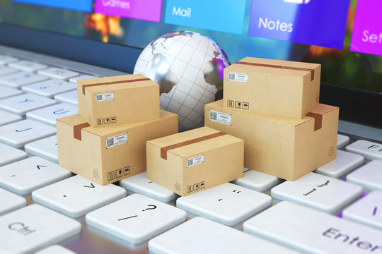 3D illustration delivery concept cardboard boxes and the globe on a laptop keyboard