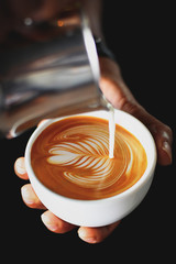 coffee latte art by coffee maker