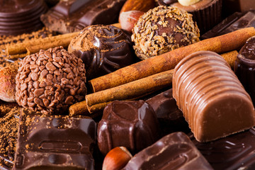 Delicious luxury chocolates as background. Close up