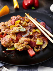 Stir fried chiken with onion and bell pepper