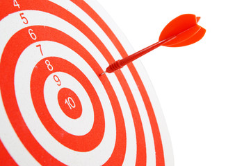 Red and white shooting target and arrow isolated on white