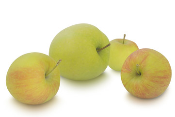 Small apples and big one isolated on white background