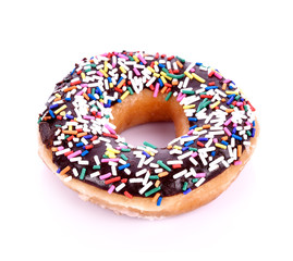 Sprinkle donut toppings on white background