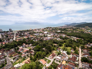 Fototapeta premium Aerial view of Cocanha Beach, Caraguatatuba, Sao Paulo, Brazil