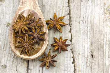 star anise on wooden spoon