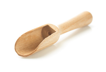 wooden spice scoop on white background