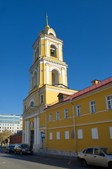 Fototapeta na wymiar Neoclassical belltower. Rozhdestvensky Convent, or Convent of Nativity of Theotokos is one of oldest nunneries in Moscow, Russia