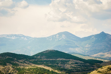 Panoramic views of mountain peaks and blue sky