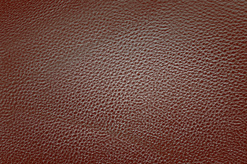 Brown leather textured background.