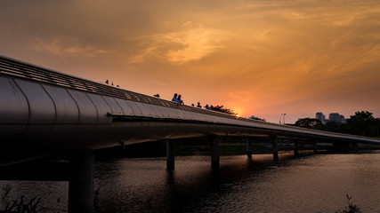 Pedestrian bridge made of metal at sunset, District 2, Ho Chi Minh City, Vietnam