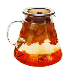 Fruity apple tea in teapot isolated on white background. Closeup.