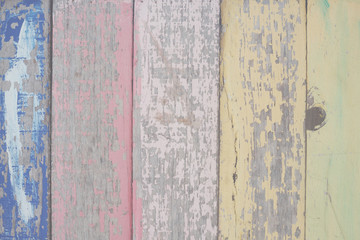pastel colored wooden background.
