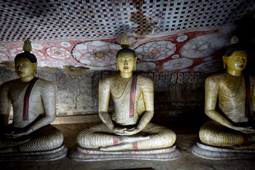 Buddha statues in cave monastery Dambulla