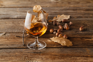 Autumn drinking time with alcohol glass