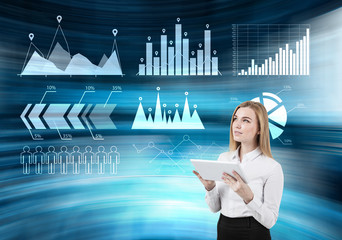 Girl with tablet and blue graphs