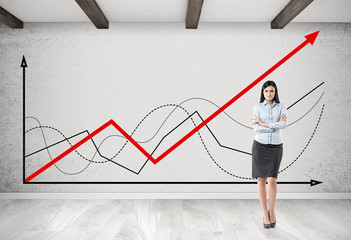 Businesswoman with brown hair near graphs