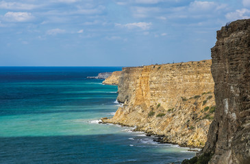 Fototapeta na wymiar The steep coast of the Black sea at Cape Fiolent. Crimea