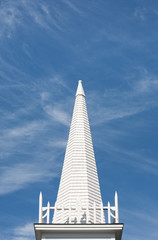 Fototapeta na wymiar Church steeple and blue sky.