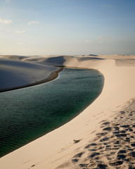 Sand dunes and freshwater lagoons found in the Lençóis Maranhenses National Park. Maranhão, Brazil.