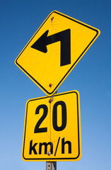 Sharp turn highway sign.