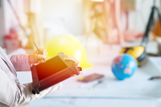 hand presses on world map with digital tablet,Industrial Contain