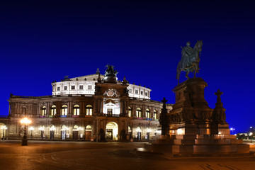 Fototapeta na wymiar Semperoper (Saxon State Opera) and monument to King John of Saxony, Dresden, Germany