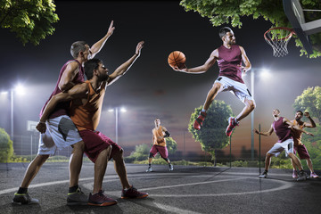 Basketball players in action on court