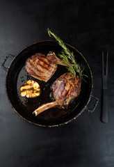 Grilled veal ribs with herbs, spices, garlic and rosemary