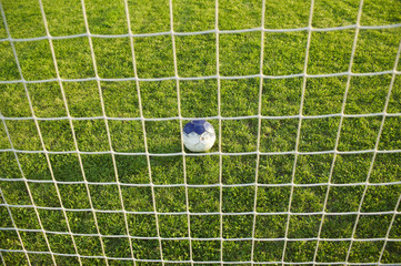 Classical old football on the playground
