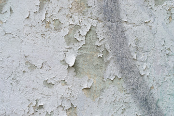 Wall fragment with scratches and cracks