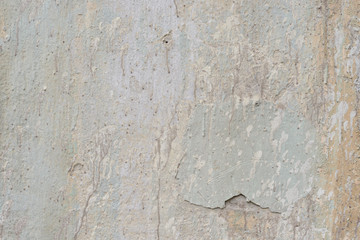 Wall fragment with scratches and cracks