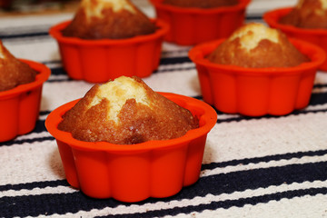 Fresh, delicious, warm muffins on a table