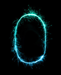 0.Digit zero made of firework sparklers at night