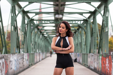Naklejka premium Sportive girl wearing black body on the street