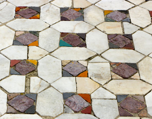 a mosaic of fragments of colored marble